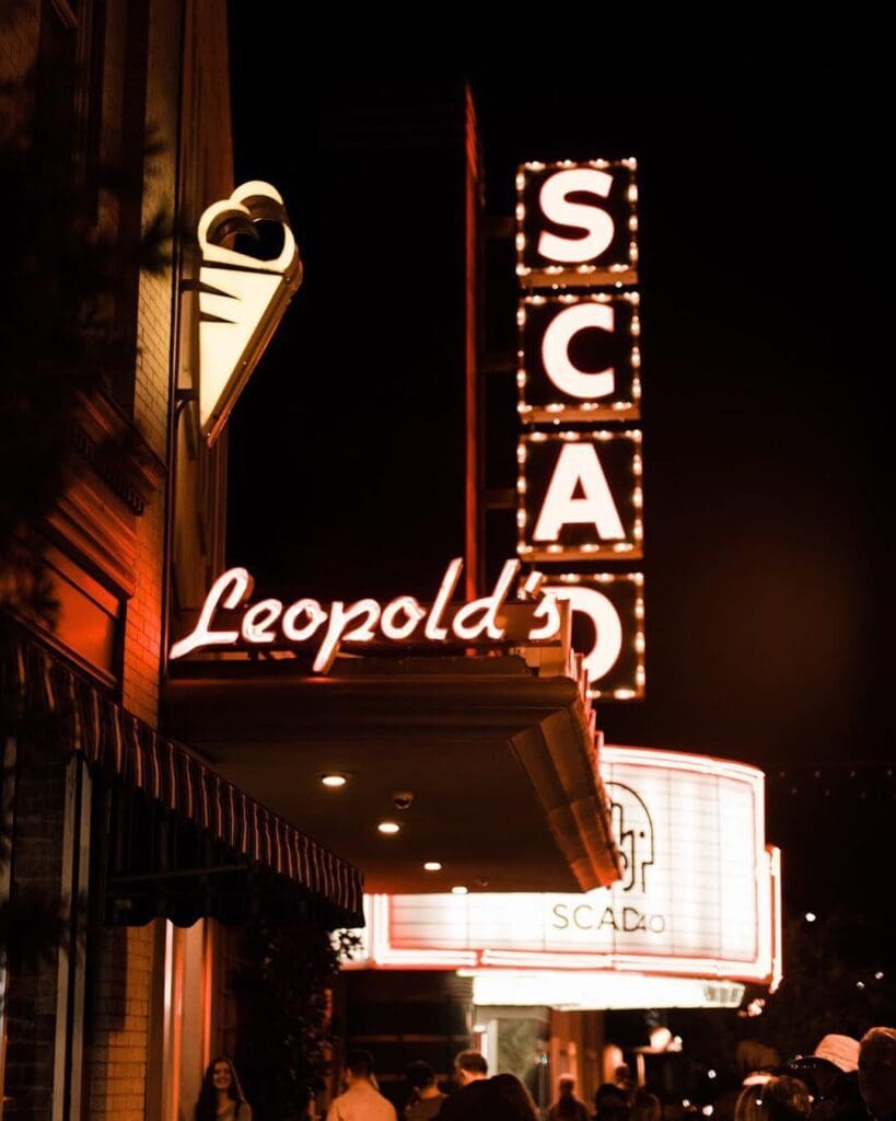 a street sign at night