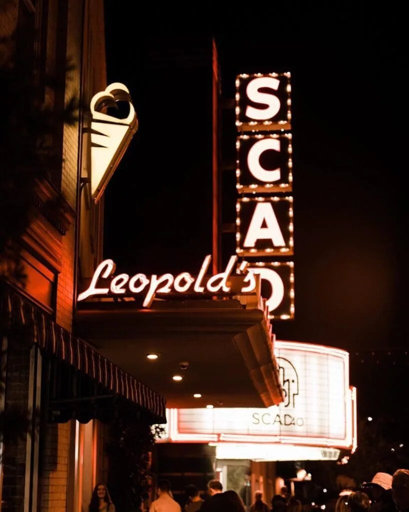 a street sign at night