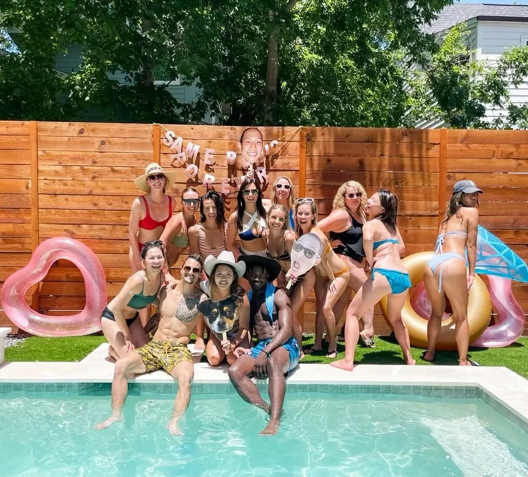 a group of people in a swimming pool