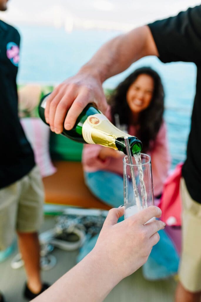 a person holding a wine glass