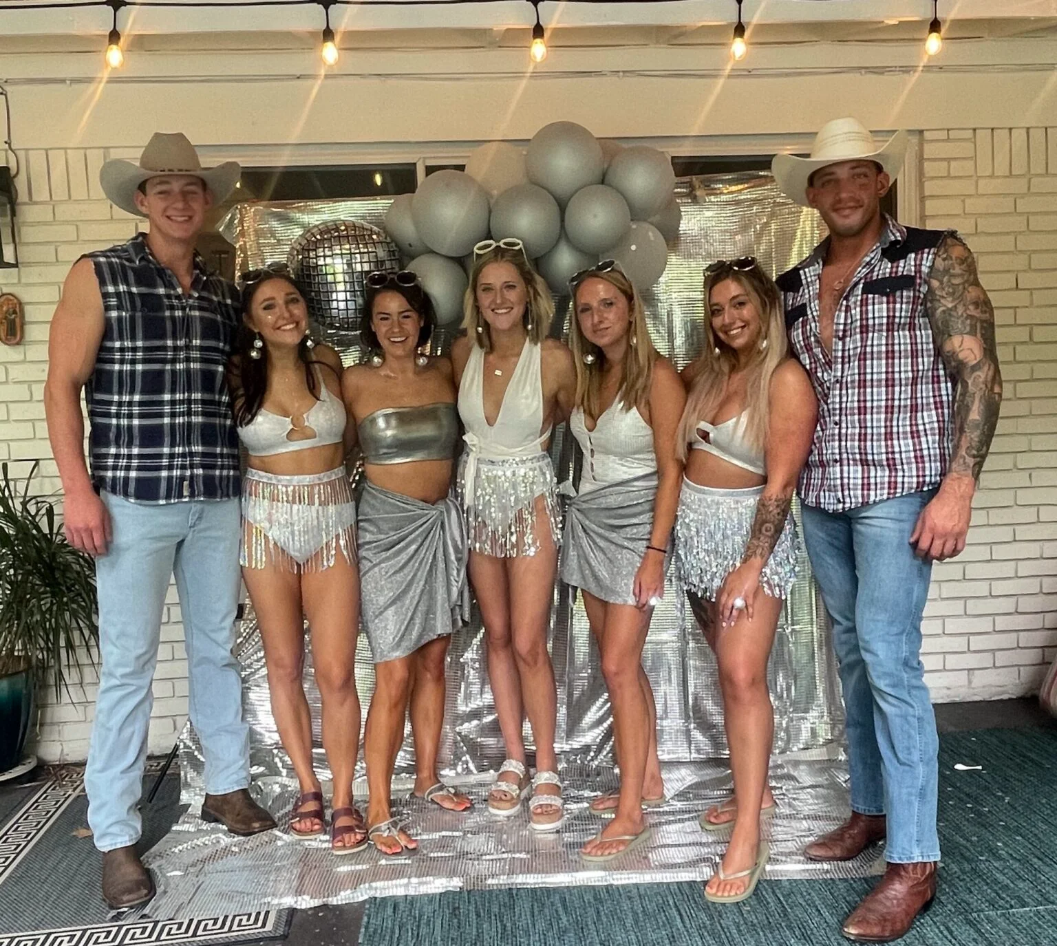 a group of people posing for the camera