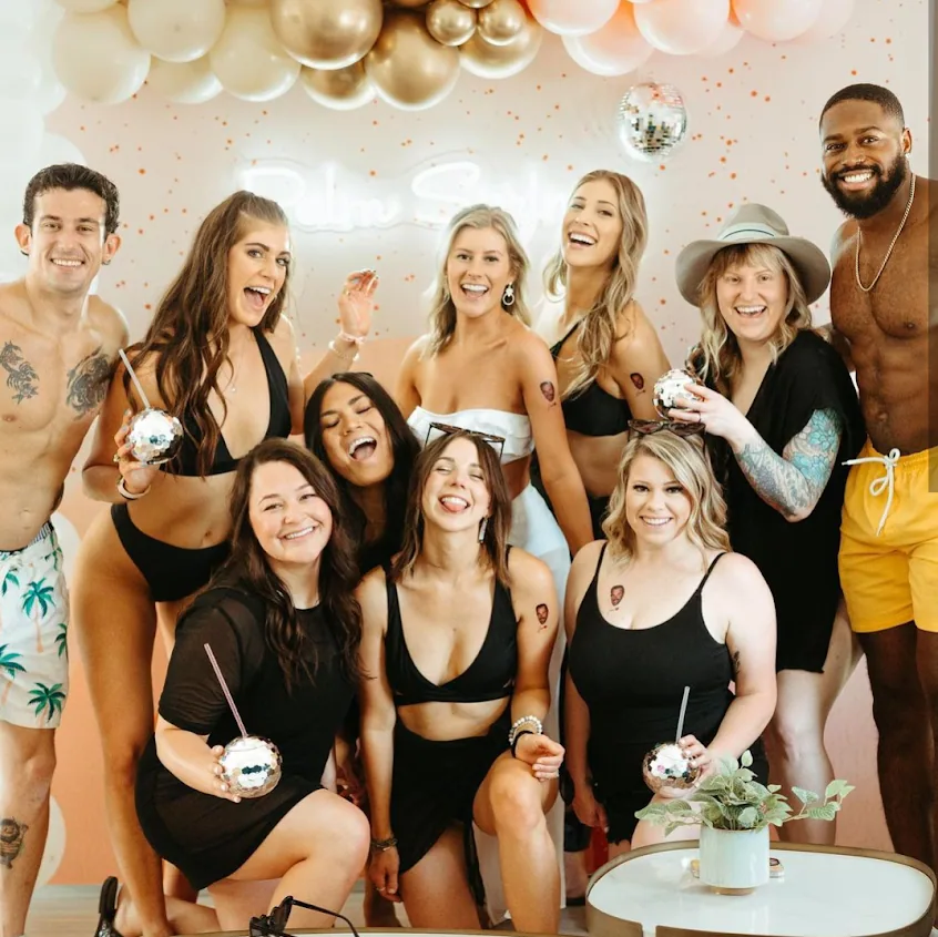 a group of people posing for a photo