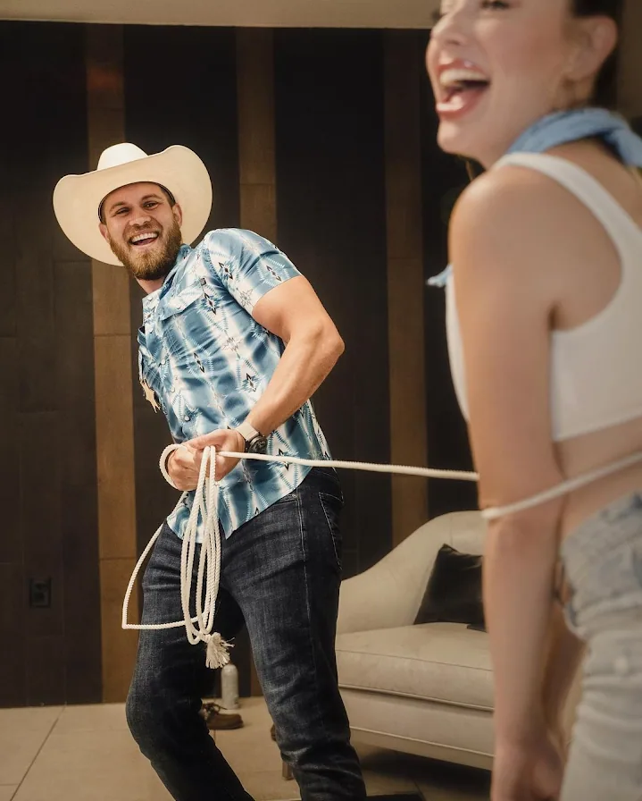 a couple of people that are standing in a room