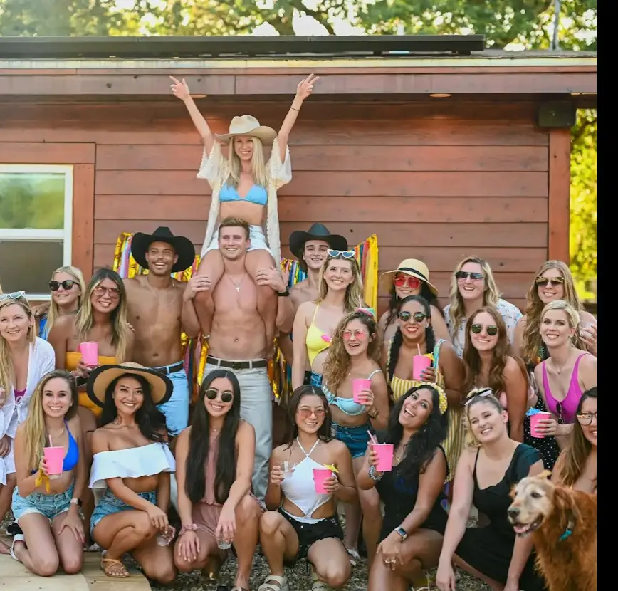 a group of people posing for a photo