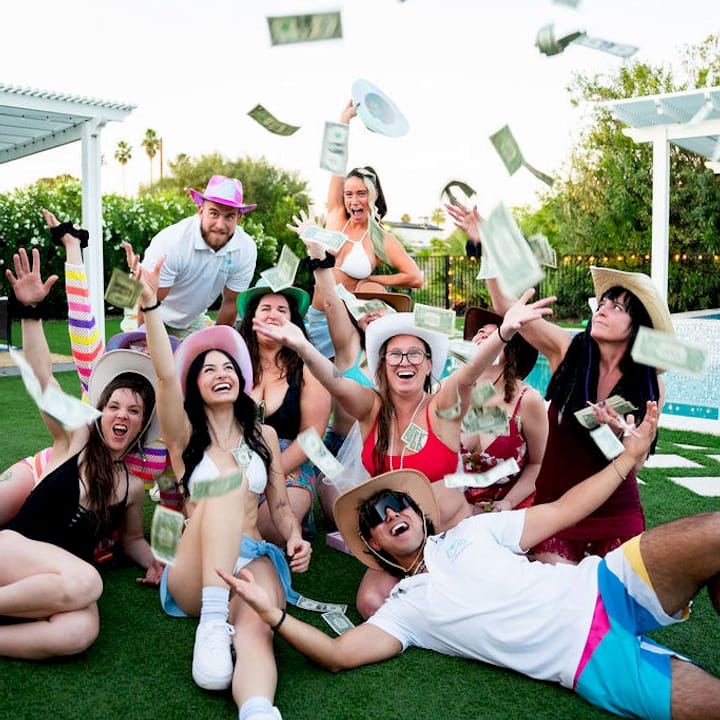 Hosts preparing large group party activities indoors
