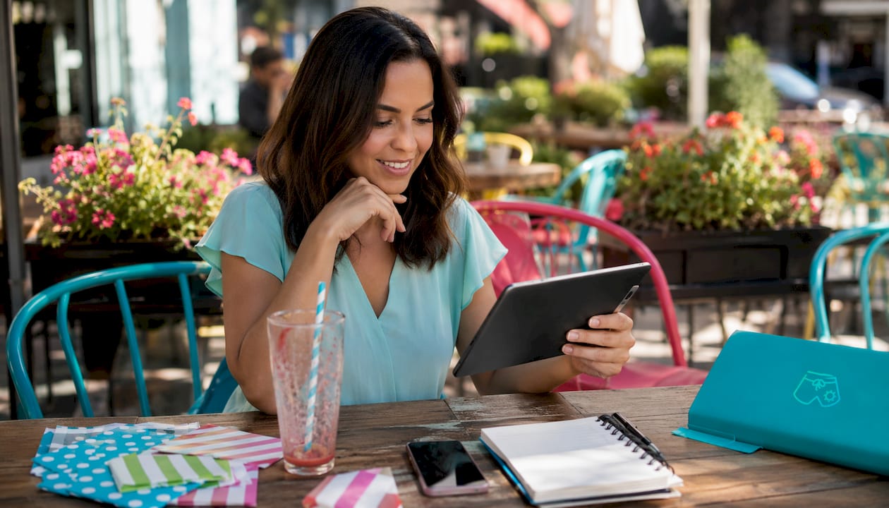 Female planner reviewing turnkey party checklist